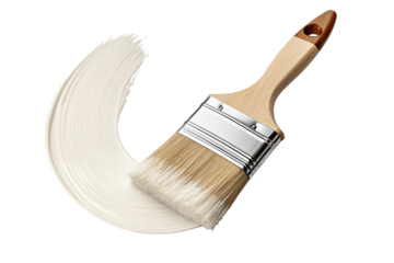 Wooden paintbrush with light beige paint stroke on black background isolated image closeup view