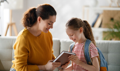 Happy family preparing for school