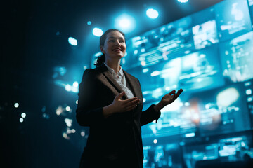 A woman is speaking on stage