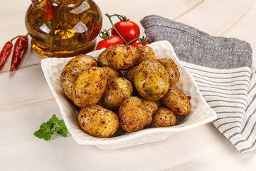 Baked mini potato with herbs