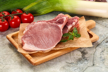 Raw pork steak loin with bone