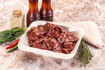 Raw uncokked chicken liver in the bowl