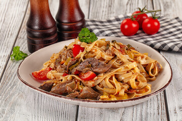 Asian udon noodles with beef
