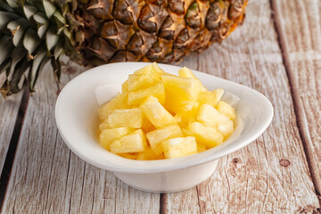 Sweet canned pineapple fruit pieces