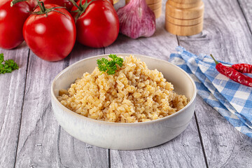 Vegan cuisine - boiled bulgur garnish