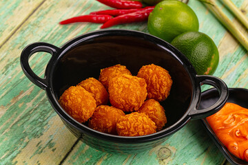 Fried crispy yellow cheese balls