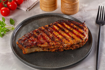 Grilled pork steak with bone