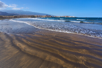 Black sand beach in El Medano