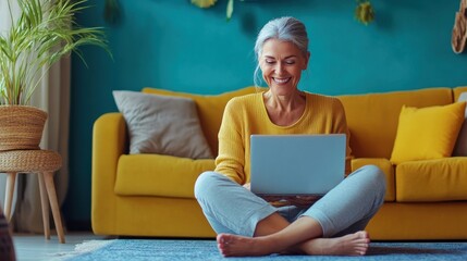 Woman working on laptop at home
