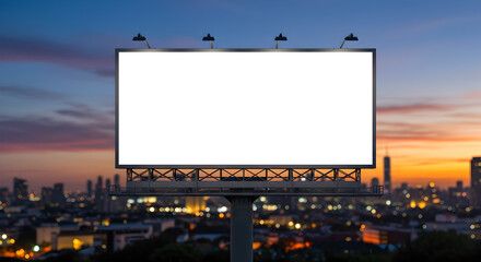 Fototapeta premium Mockup empty white advertising placed billboard in city evening. Outdoor advertisement template poster for urban commercial marketing campaigns. Selective focus