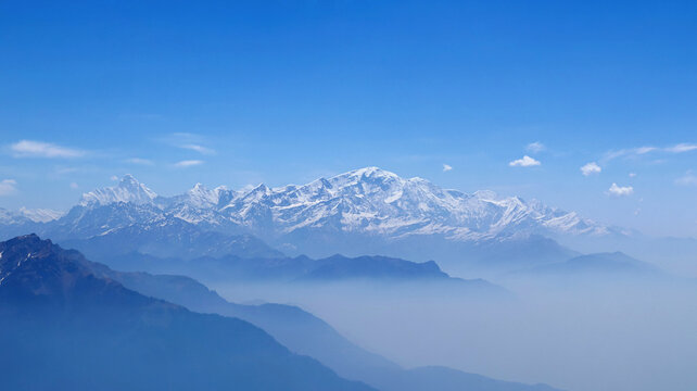 Panoramic view of Himalayan mountain range from Chandrashila Peak, located in Chopta, Rudraprayag, Uttarakhand, India.