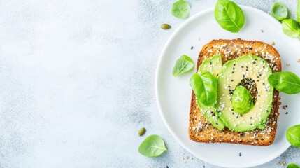 Avocado Toast Delight: A culinary masterpiece, a single slice of toast adorned with creamy avocado and fresh basil, all artfully arranged on a plate and ready to serve