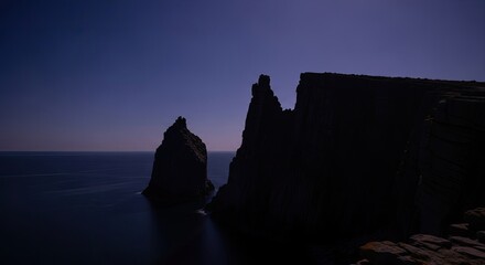 Coastal Cliffs Landscape Under Night Sky