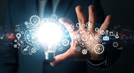 Businessman's hand holding a bright glowing light bulb surrounded by intricate digital gears and various technology icons, symbolizing innovation and ideas.