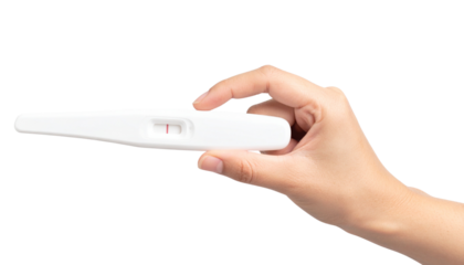 positive pregnancy on test strip holded in hand pregnancy test strip, awareness concept