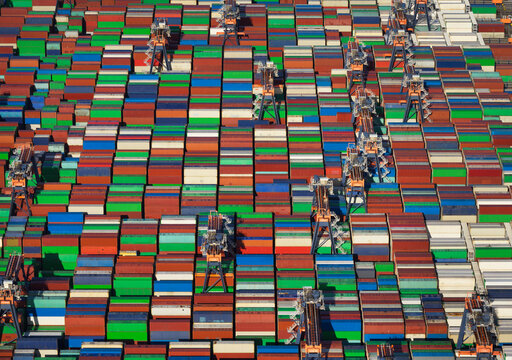 Multi colored containers on Rotterdam harbor in Netherlands