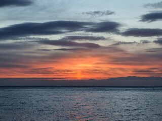 Sunrise over Lake Baikal with Crimson Sky in Winter