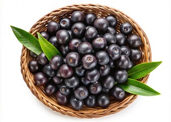 A basket full of fresh and organic Acai berries with vibrant green leaves