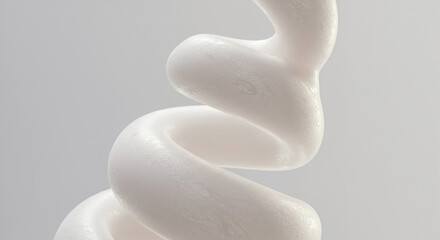 A detailed view of a twisting, white cleanser foam swirl on a neutral background with copy space