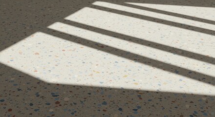 Fototapeta premium Sunlight Patterns on Textured Floor Surface with Shadows Cast