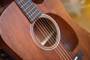 Obraz premium Brown wooden mahogany western guitar