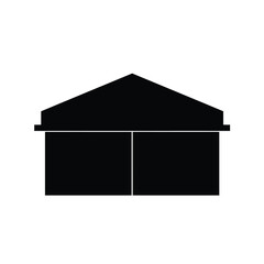 Black silhouette of a large building with a pitched roof