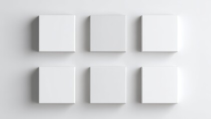 Six blank, white, square canvases mounted on a white background