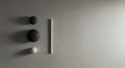Minimalist Composition of Black and White Geometric Shapes on Surface