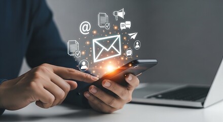 A person is using a smartphone for email marketing and digital communication, focusing on business growth and customer engagement strategies