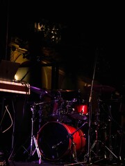 Musical Drums on Stage Under Vibrant Lighting