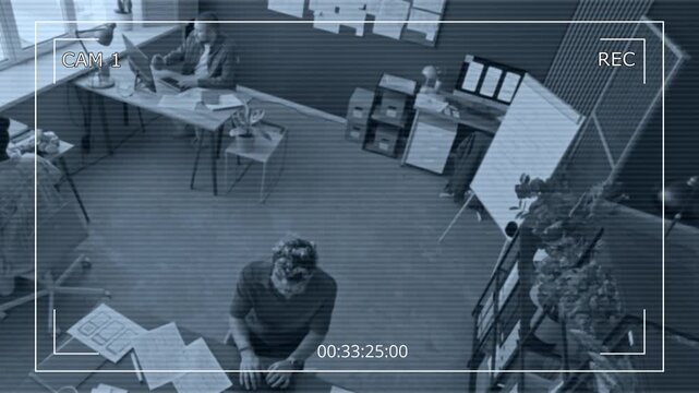 Security camera footage of diverse creative team of UX designers working using computers then gathering at whiteboard for work plan discussing in modern office space
