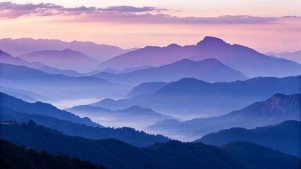 Fototapeta premium Majestic Mountain Landscape at Dawn with Soft Purple Hues and Mist