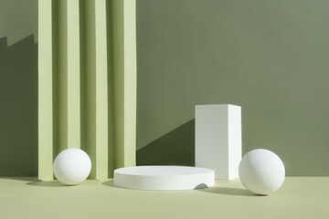 White podiums of various shapes on an abstract green background. A scene with a geometric backdrop. Empty showcase, display case for the product presentation.