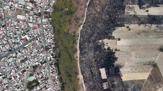 cenital aerial shot of urban poverty on a volcano in mexico city