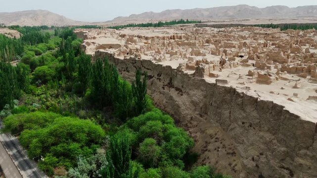 Aerial view of Xinjiang Jiaohe Ruins Ancient City in China Tupan drone unesco archaeologic site