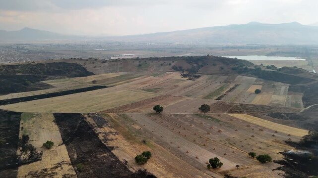 rotational shot of a fire at the volcano crater near mexico city