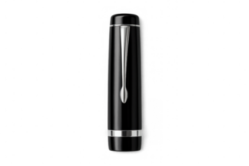 Sleek black and silver pen lying gracefully against transparent surface, highlighting premium writing instrument with refined aesthetic