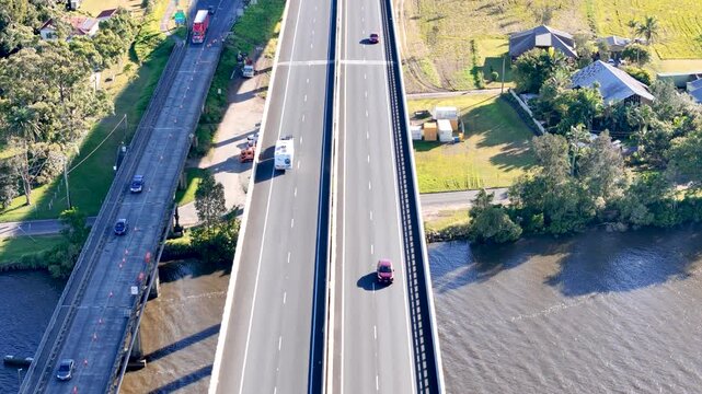 A caravan heads north across the Harwood Bridge and over the Clarence River in New South Wales Australia.