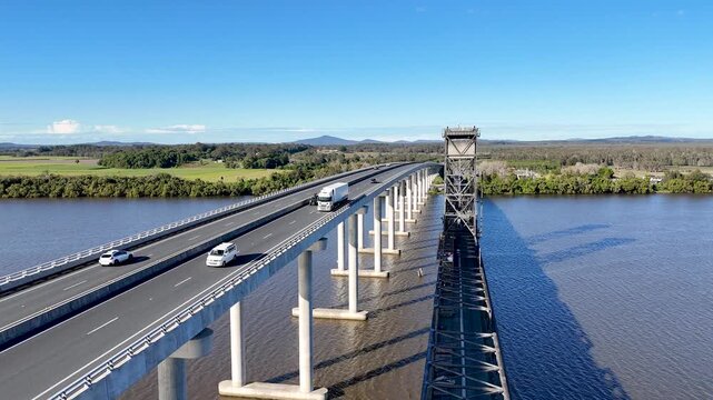 Scenic drone footage of Harwood Bridge soaring over Australia&rsquo;s Clarence River in NSW.