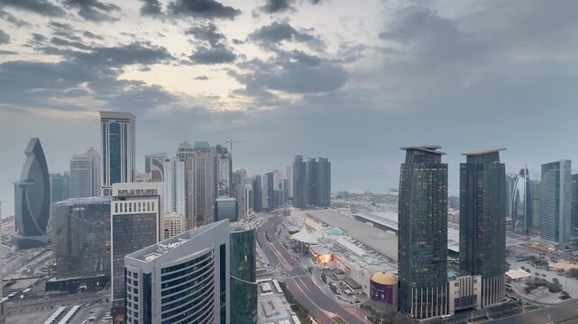 Doha, Qatar - February 17, 2025: Aerial view illuminated Doha skyline with Hotel Sheraton Grand Doha