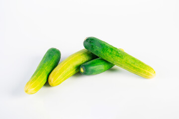 Fresh cucumbers on white background.