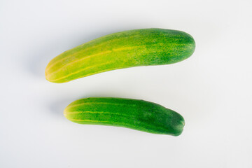 Fresh cucumbers on white background.
