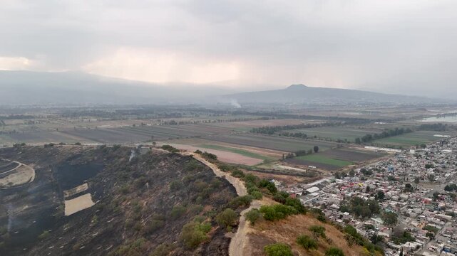elevation shot of volcanos and lakes in mexico city