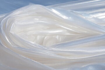 Obraz premium Soft, flowing white fabric folds