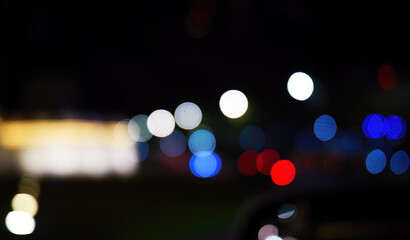 Defocused of blur lights, nightscape, dark night with blurred bokeh spotted lights, backdrop wallpaper