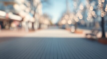 Obraz premium Blurred city street with empty walkway and soft bokeh lights. Shallow depth of field at dusk. Calm urban momentum and anticipation. Ideal for business banners and website headers.