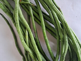 fresh green beans in white background 