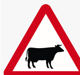 road sign cow crossing