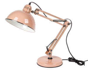 Stylish articulated desk lamp in soft pastel pink illuminating on black background