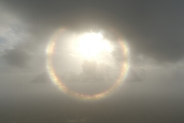 Obraz premium Sun halo ringed by clouds